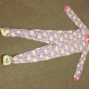 A light purple,pink and white footie pajamas.